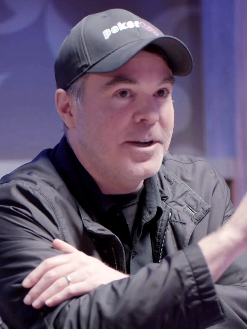 Cary Katz wearing a PokerGO cap in a candid portrait photo