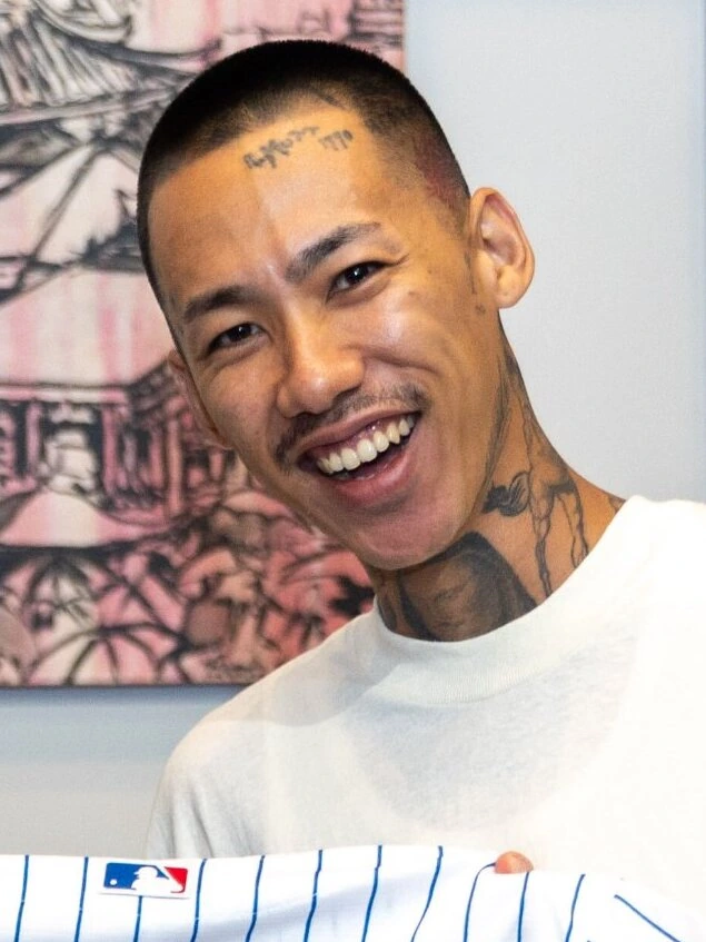 Yūki Chiba smiling in a close-up portrait.