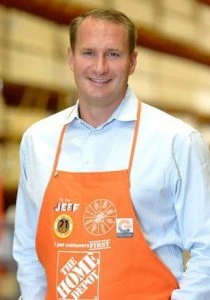 Jeff Kinnaird in a Home Depot apron, smiling in a store setting.